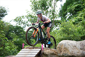 Erin Huck at the Sakura Drop on the Women's XC Course in Izu. Photo: Casey Gibson