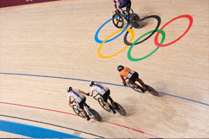 Valente & Jastrab making an exchange during the Women's Madison Olympic debut. Photo: Casey Gibson